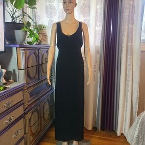 Sleeveless, black dress with lace back and belt